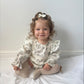 Flora Romper £13.90  (Available from size 0-3 m)