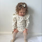 Flora Romper £13.90  (Available from size 0-3 m)