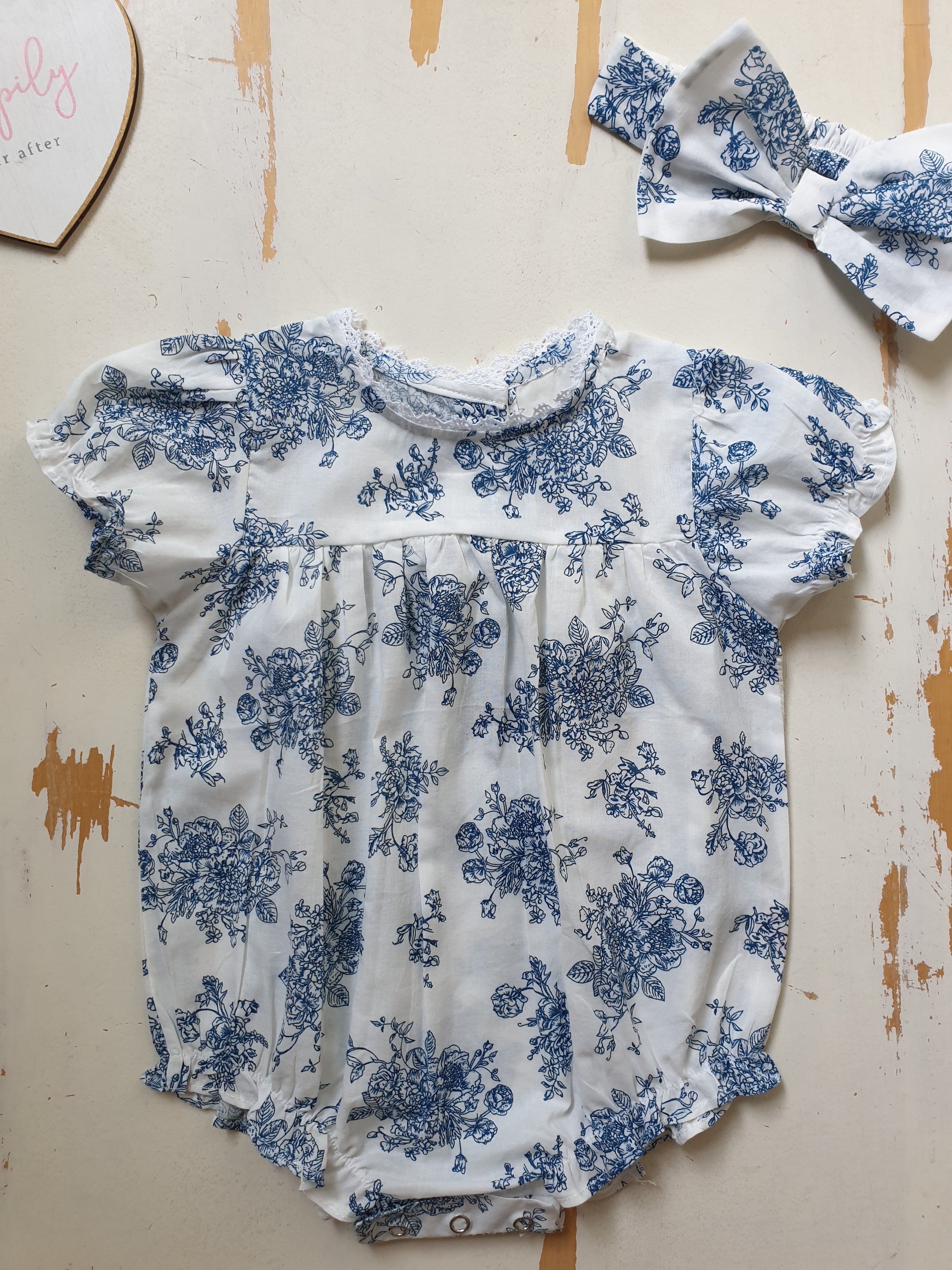 Newborn floral romper hotsell